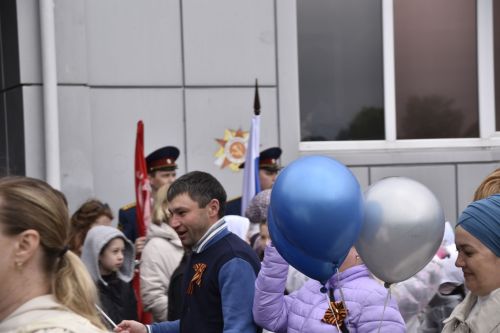 Торжественное шествие колонн на стадионе имени Ленина в честь 80-летия Победы